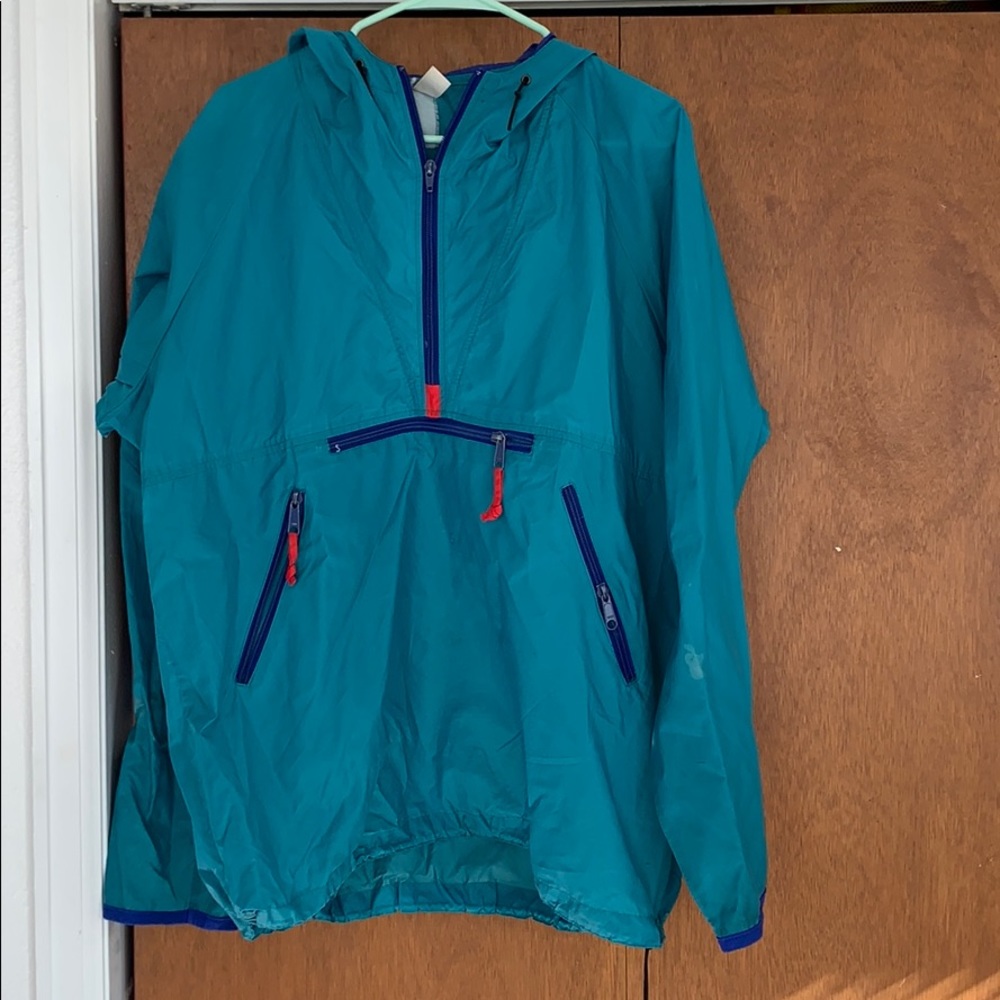 Teal hooded wind breaker